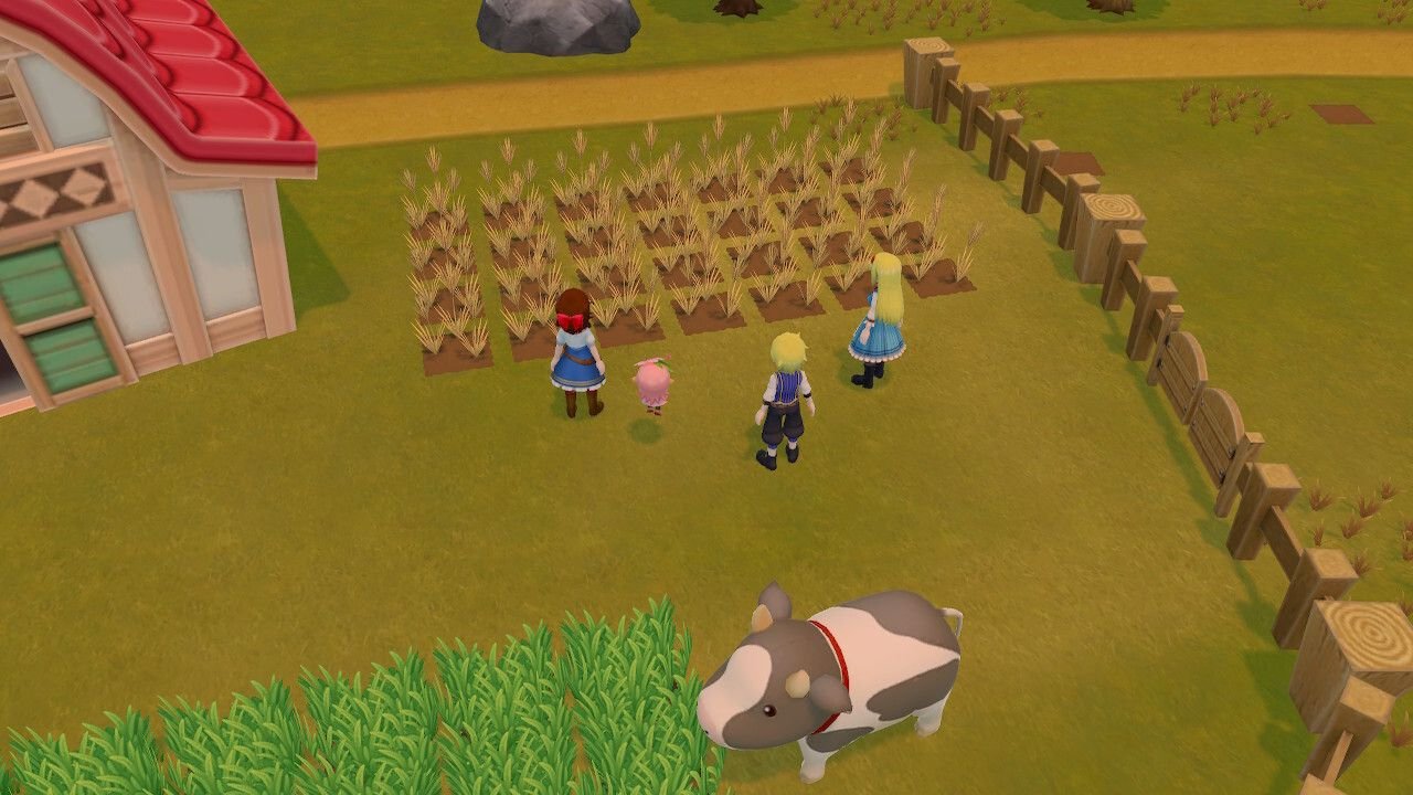 Characters stand facing a field of wheat, while behind them, a plump cow munches on vegetation.