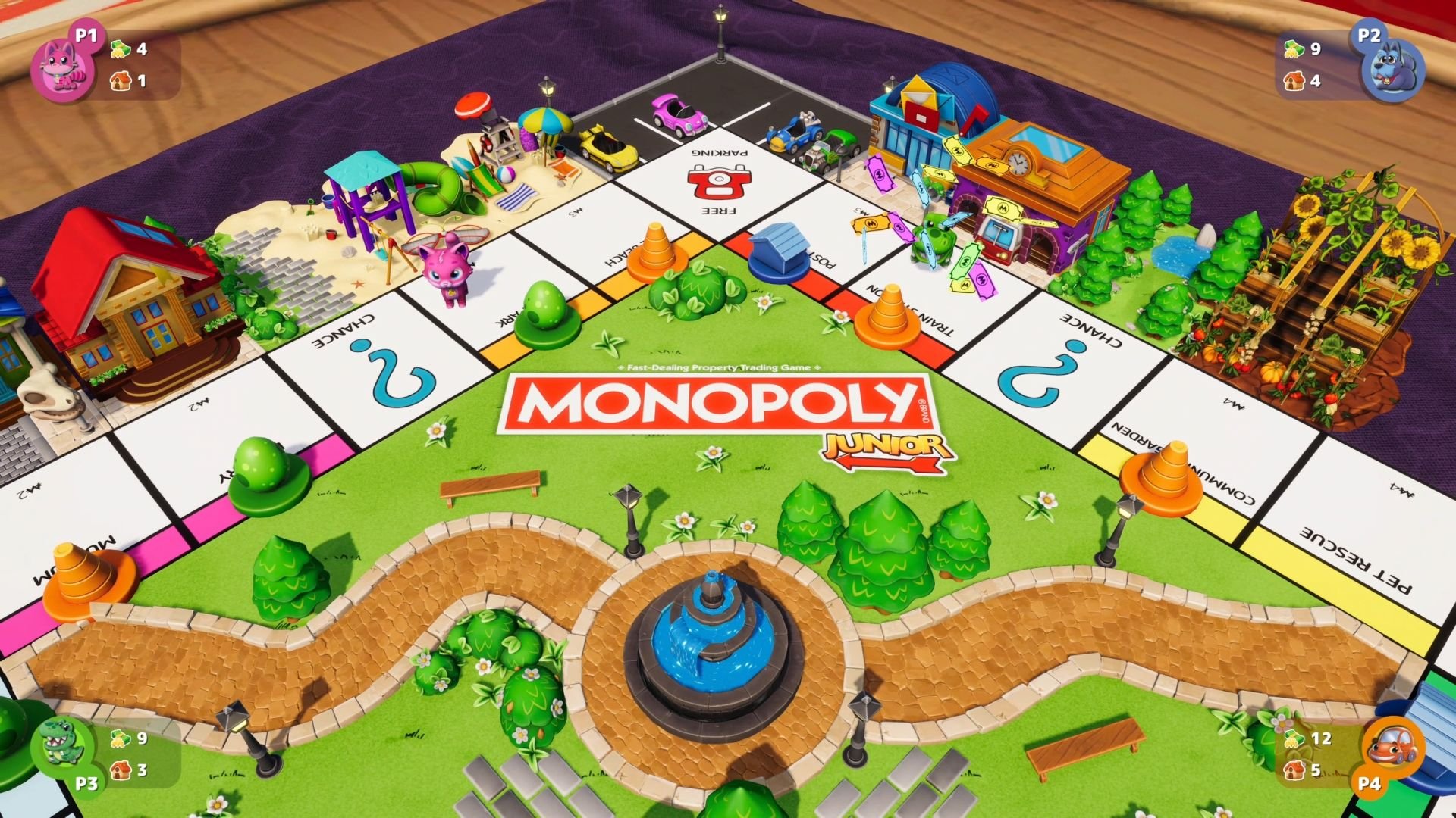 On the Monopoly Junior board, a green token sits on a red square as Monopoly money showers it.