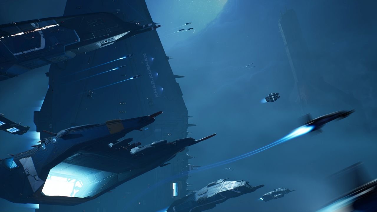 A fleet of spaceships flying toward the right, in profile, some close and some distant.