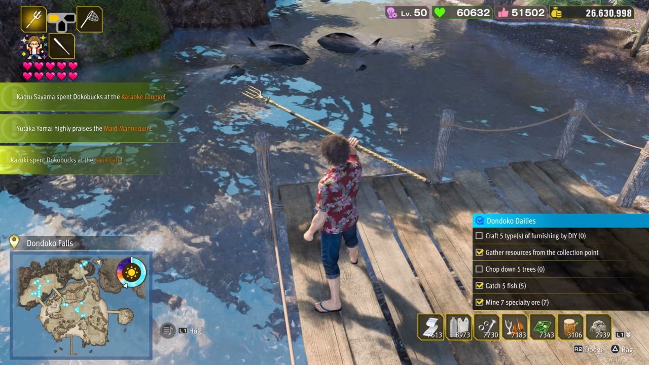Fishing off the pier at Dondoko Falls with a trident