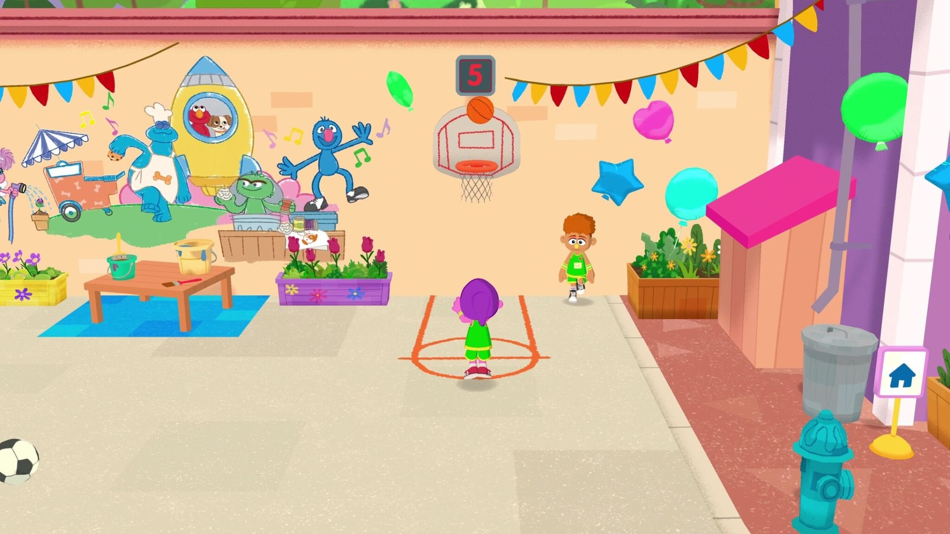 The player puppet tosses a basketball toward a hoop that hangs from a wall with puppet graffiti depicting Grover.