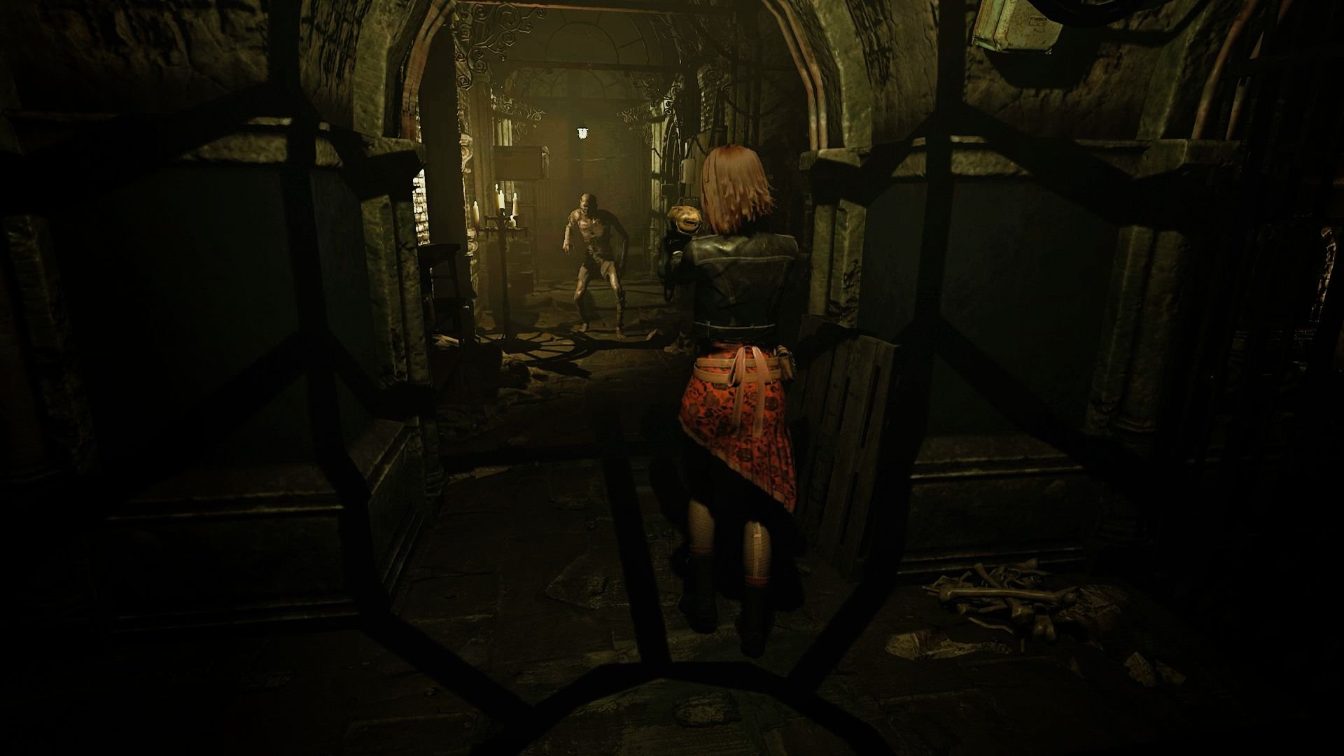 Caroline, dressed in a red skirt and leather jacket, stands her ground as a monster shambles along the narrow corridor ahead of her.