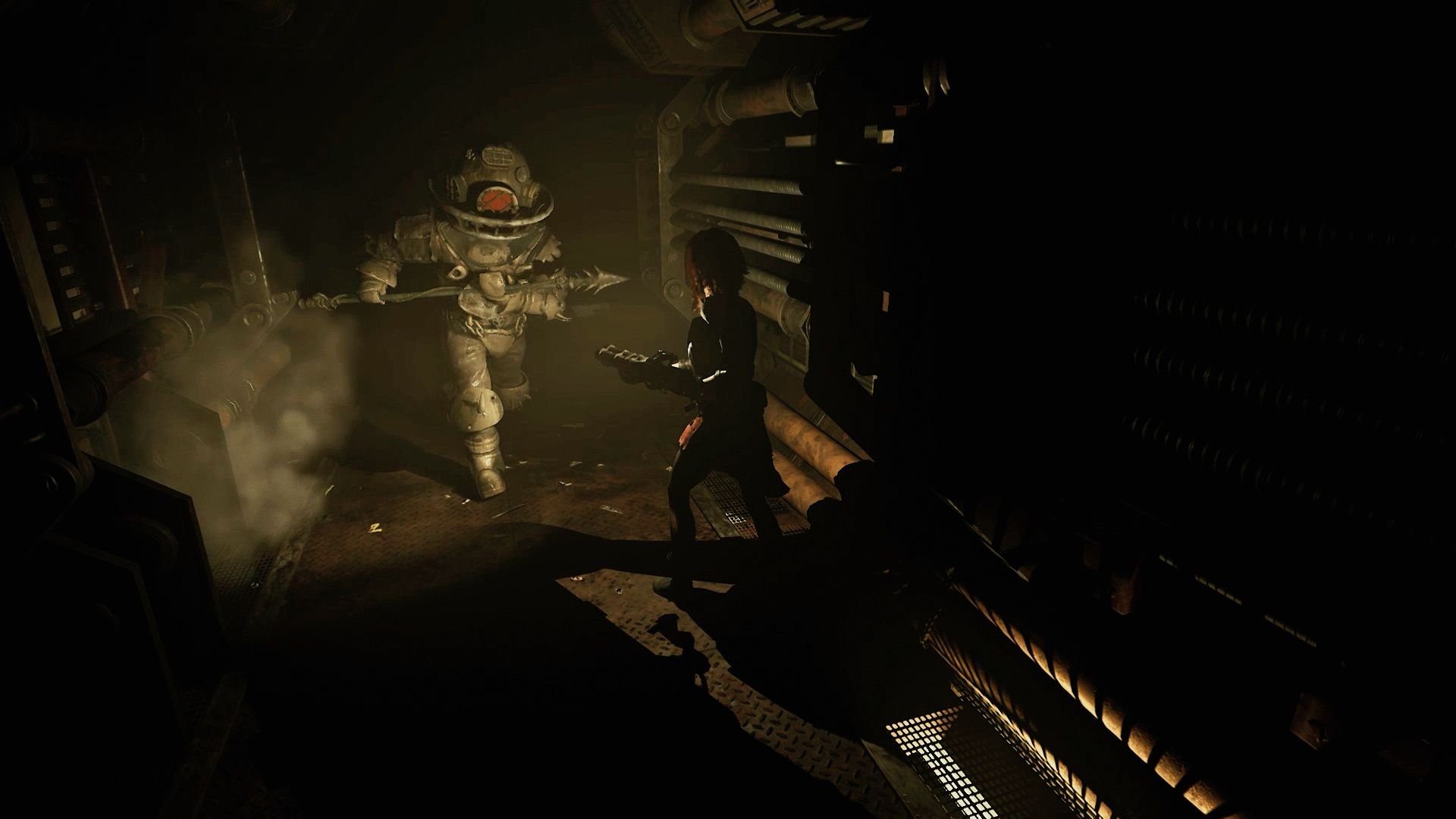 Caroline stands near some pipes as an apparent enemy approaches quickly, dressed in a puffy suit and holding a spear.