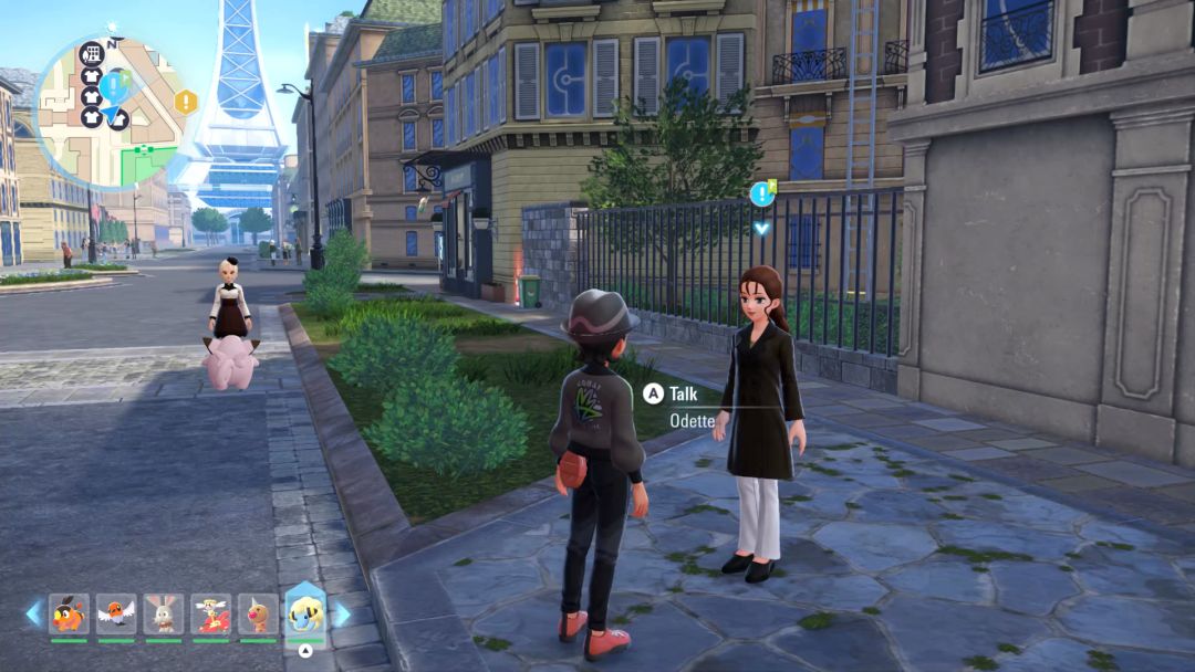 The Pokemon Trainer approaches Odette, who stands on a sidewalk near some bushes, with a building and ladder behind her.