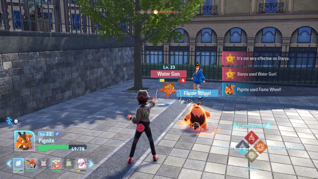 The Pokemon Trainer and Lida battle, with Staryu and Pignite using their special moves against each other.