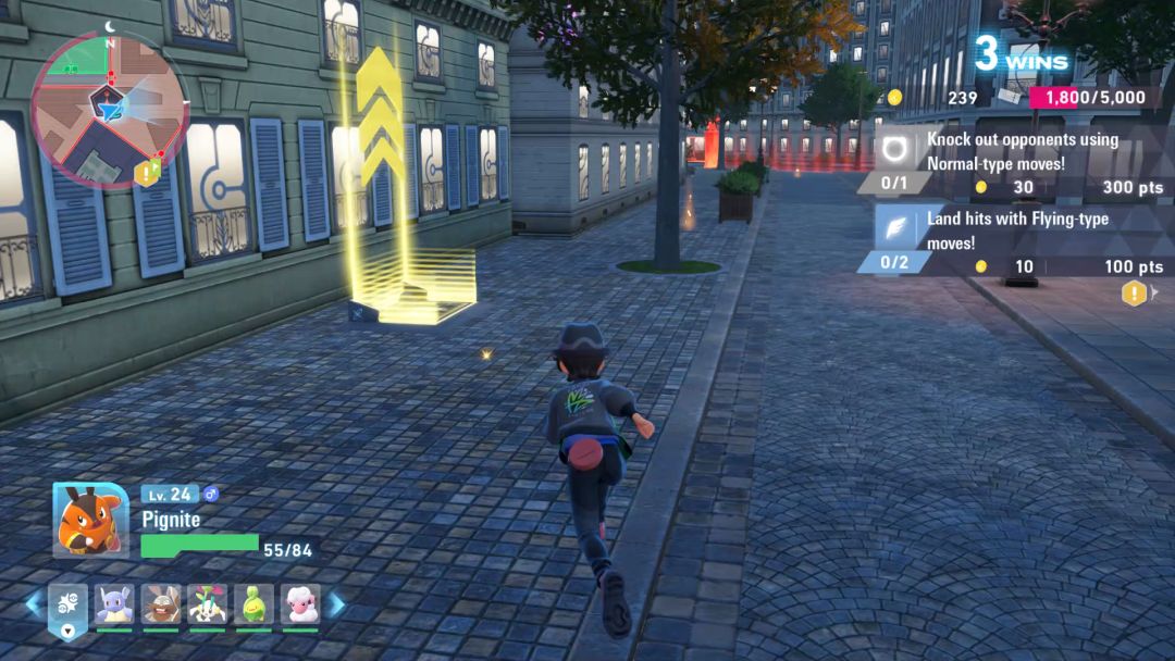 The Pokemon Trainer runs toward the Holovator they can use to reach the rooftop battles in the Battle Zone.