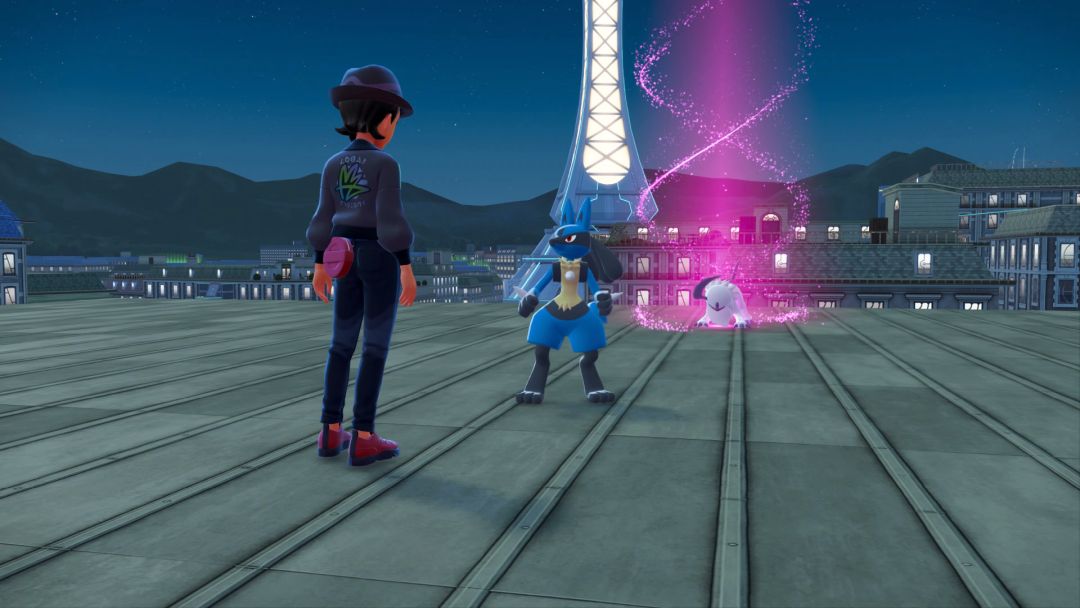 The Pokemon Trainer meets with Lucario on the rooftop, while in the background, the Rogue Mega Absol stands in a cloud of purple light.