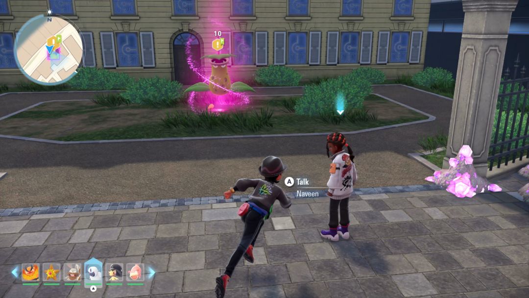 Naveen stands at the edge of an asphalt lot, looking toward the Mega Rogue Victreebel, as the Pokemon Trainer runs toward them.