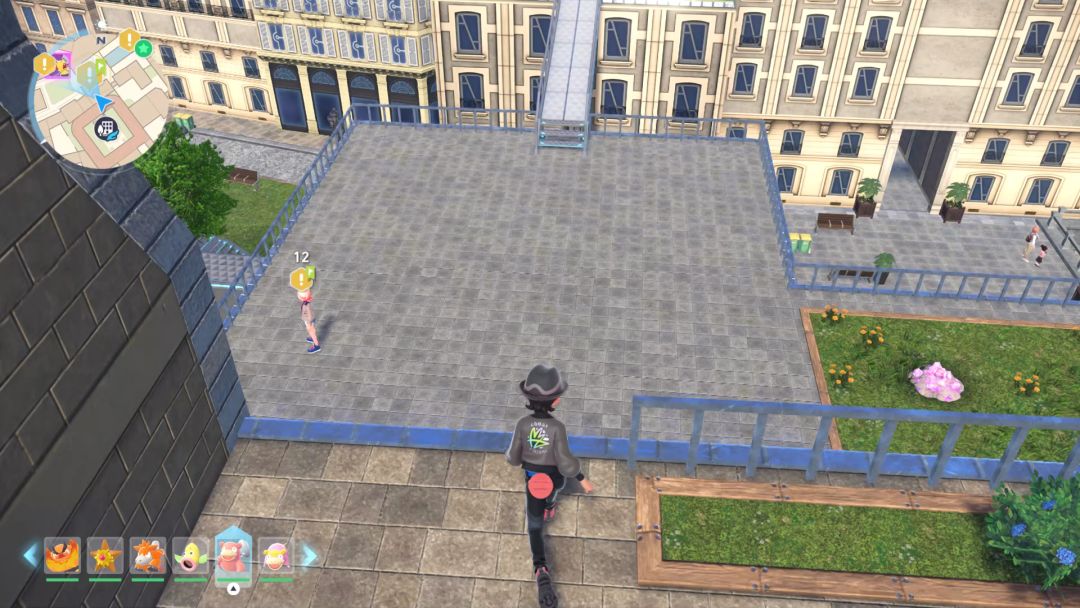 The Pokemon Trainer heads along the rooftops above Hotel Z and spots Taunie standing on a flat roof ahead, looking off toward the horizon.