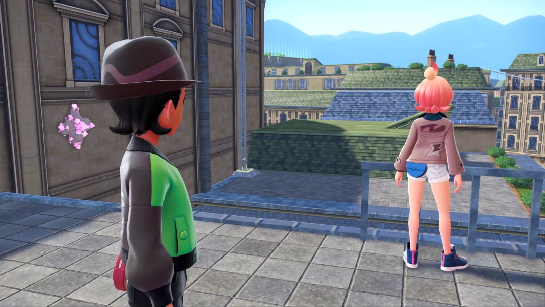 The Pokemon Trainer watches Taunie, who has her back to him as she looks toward a gap between nearby rooftops.