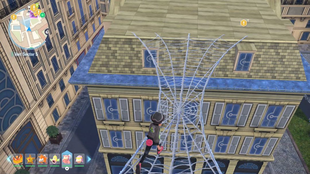 The Pokemon Trainer runs along some webbing that extends between two rooftops as a bridge.