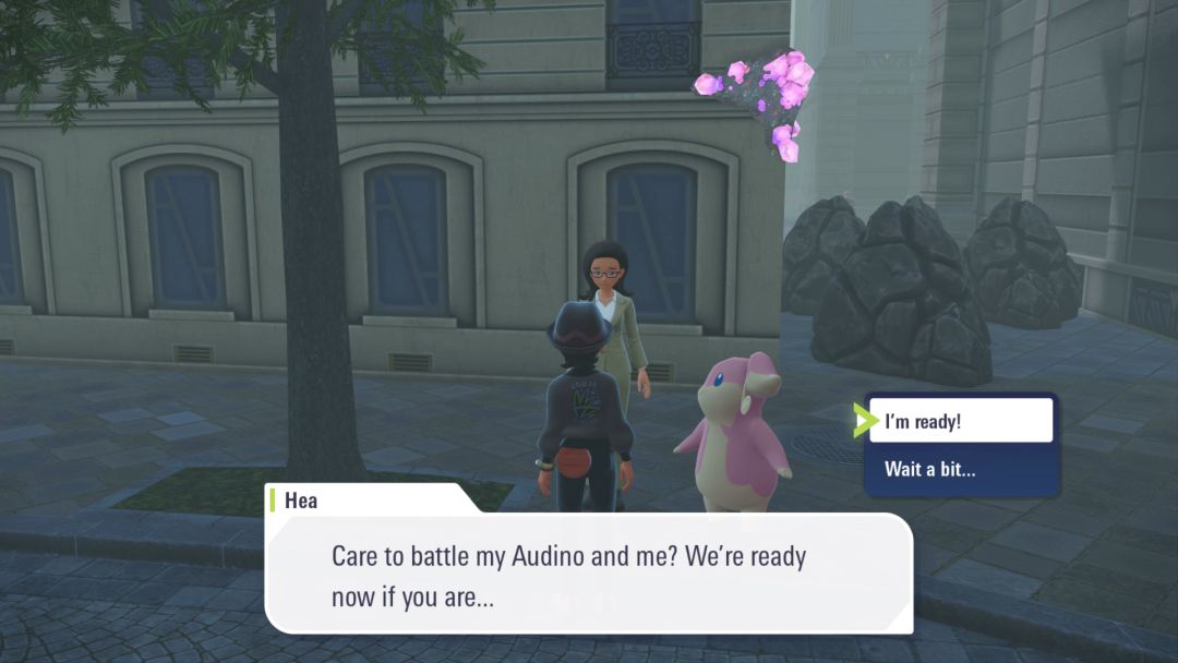 Hea challenges the Pokemon Trainer to defeat her Audino in a Pokemon battle.