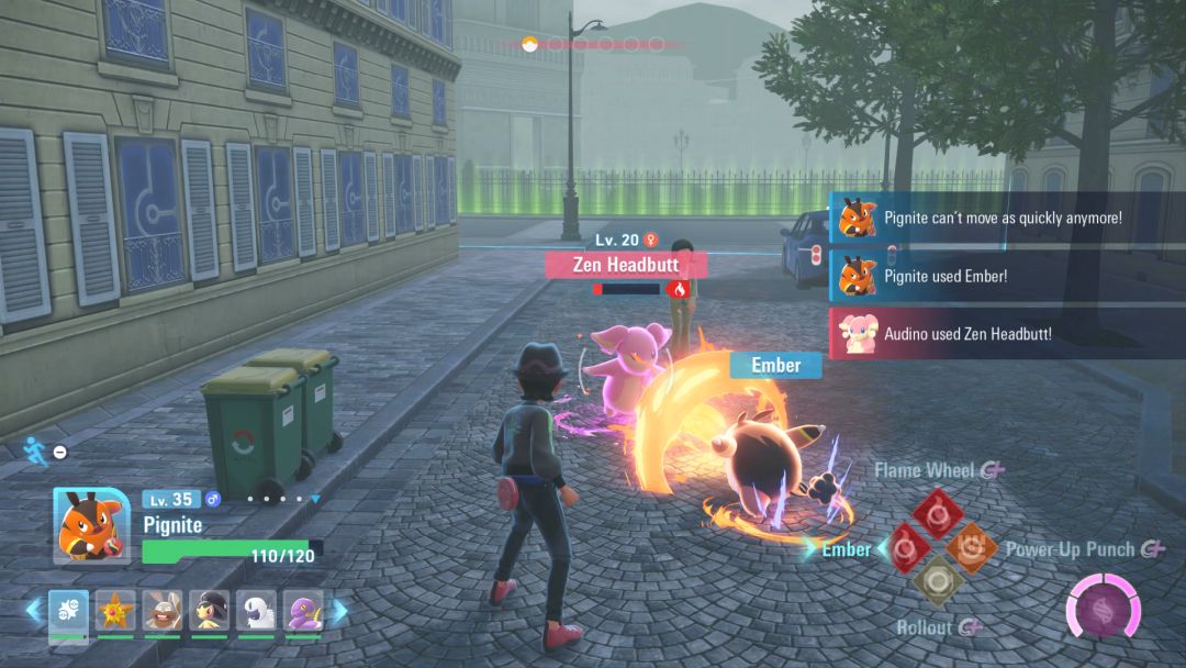 Audino and Pignite face each other in battle, with fiery light between them as the Audino uses a headbutt move.