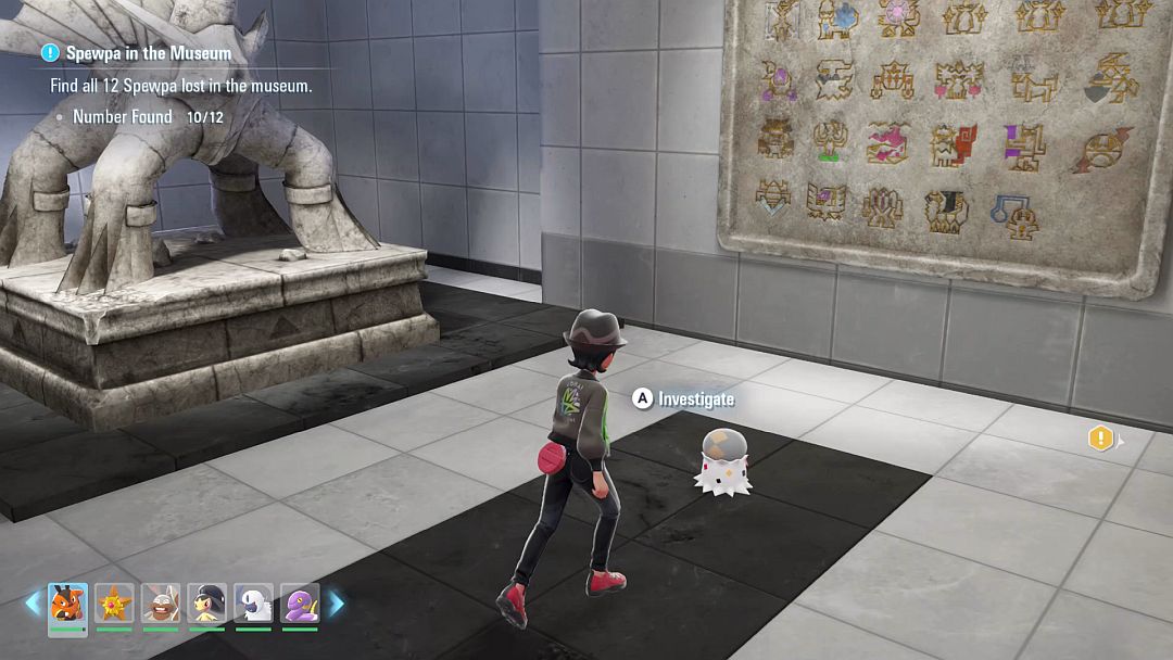 (11) In the third room on the museum's second floor, a Spewpa stands near a statue of a Pokemon, looking up at a mural.