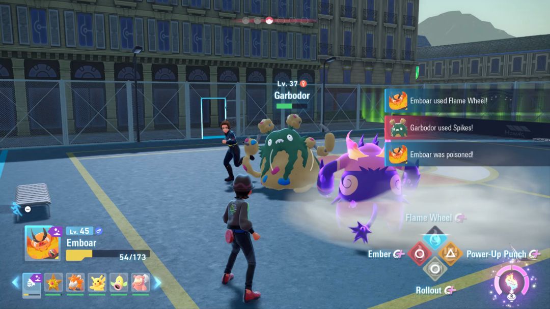 A poisoned Emboar wades past the edge of some fog as it faces off against a hulking Garbodor at close range.