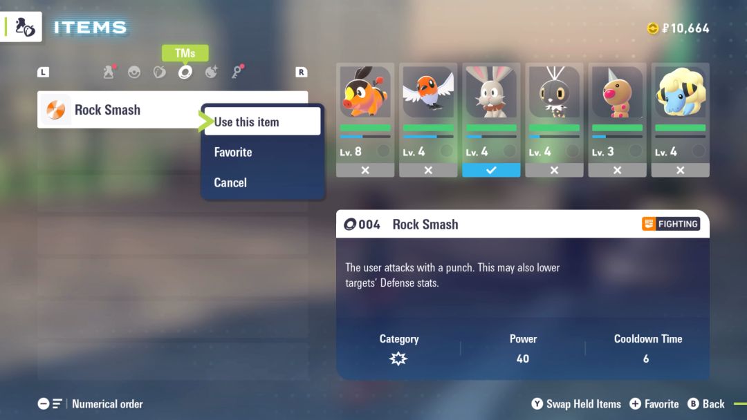 A view of the Satchel menu, showing the TM tab where Bunnelby is about to learn the Rock Smash move.