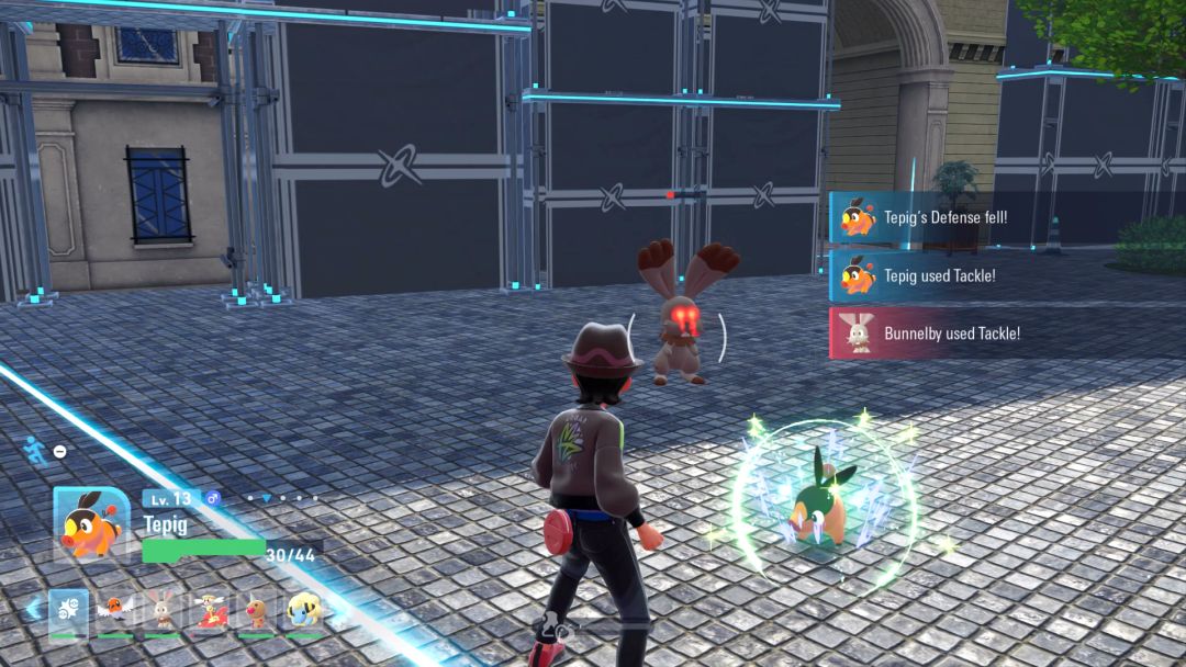 Tepig faces off against a Bunnelby with glowing red eyes in a battle in a confined courtyard space.