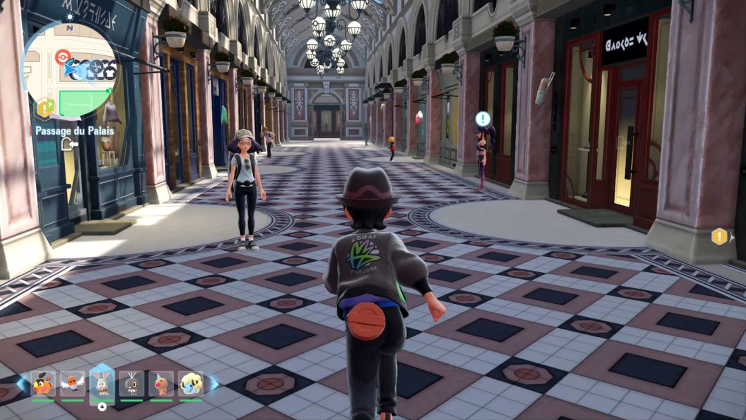 Tracie stands near the right side of the Passage du Palais, a strip of indoor shopping facilities.