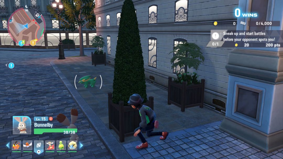 Sneaking up on a rival trainer in the Battle Zone, relying on bushes for cover and sending Bunnelby to launch a surprise attack.